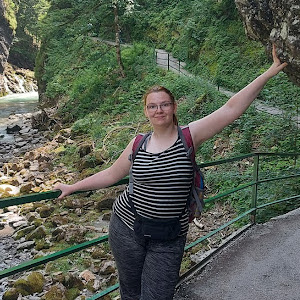 Rebecca wandering through cliffs